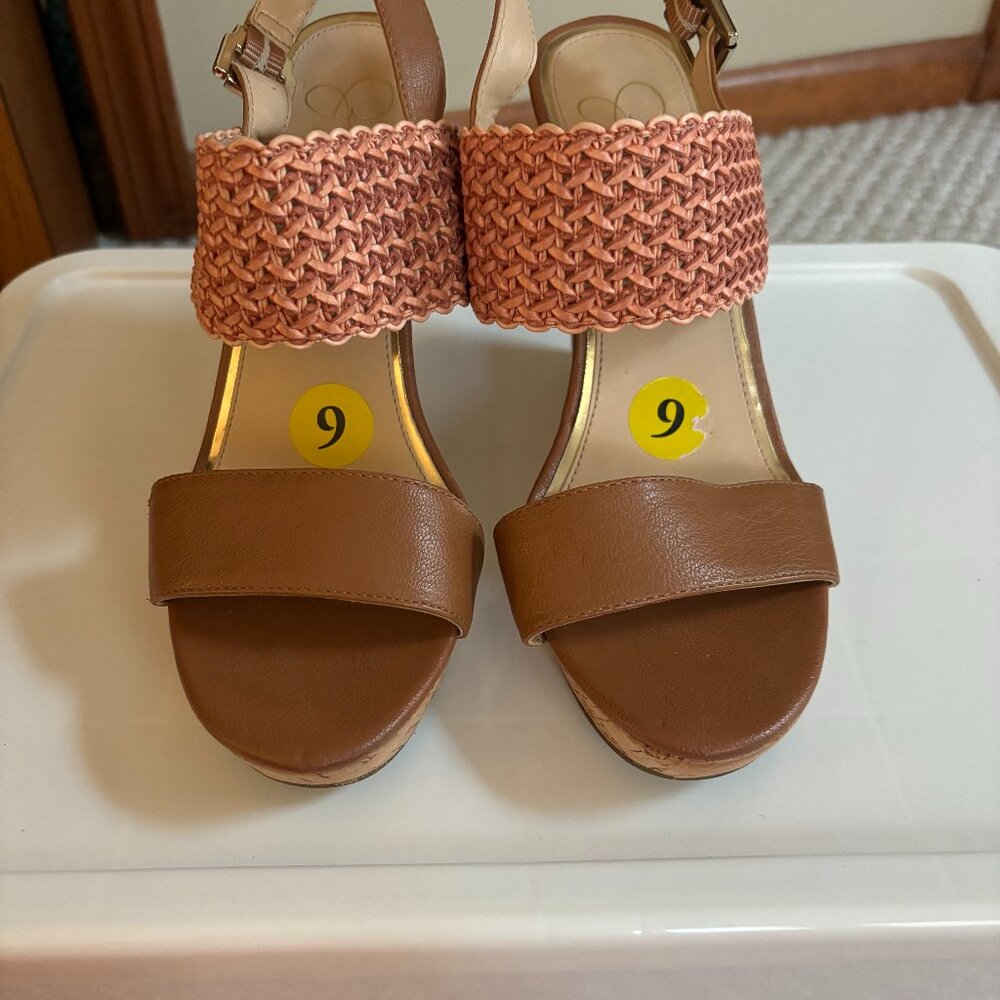 Beautiful brown/(almost orange looking at top band) cork wedge sandals.